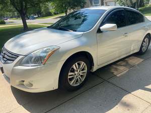 2011 Nissan Altima with White Exterior