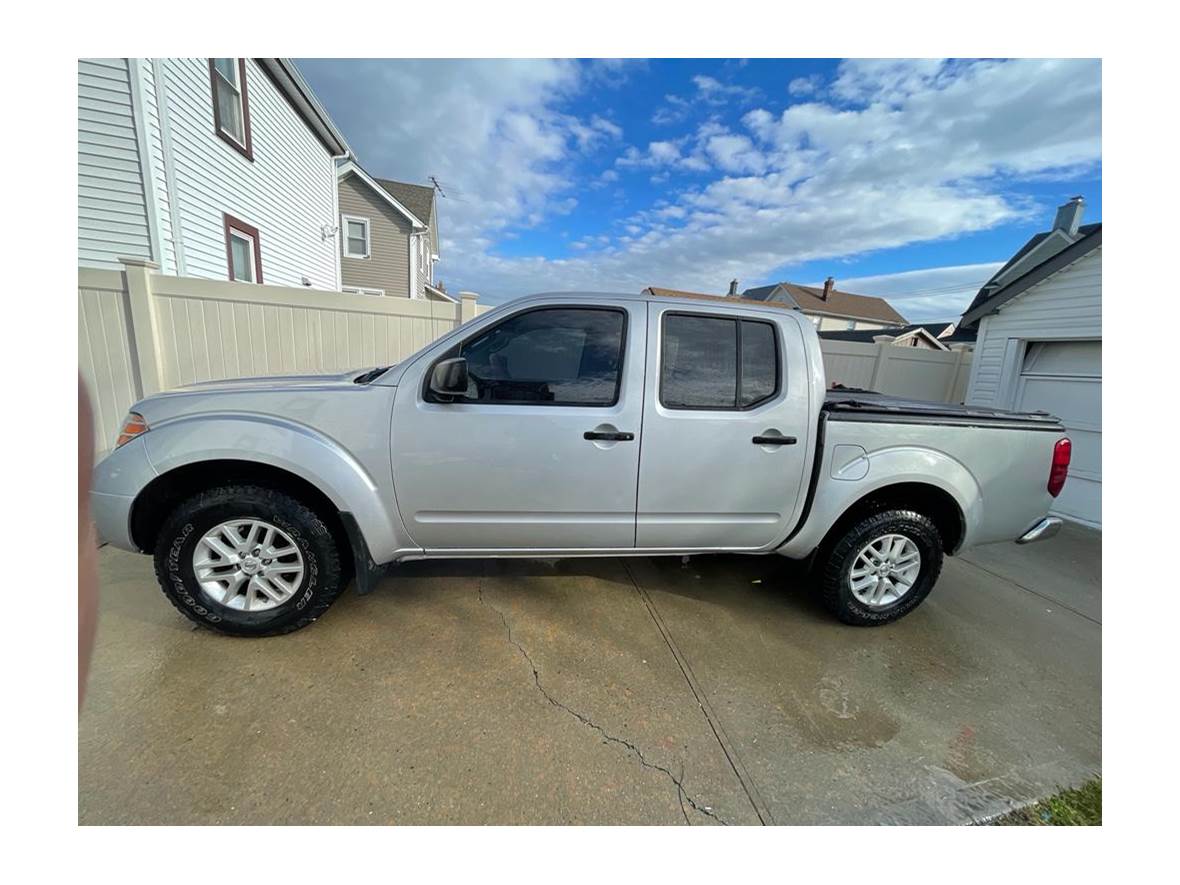2014 Nissan Frontier for sale by owner in Elmont