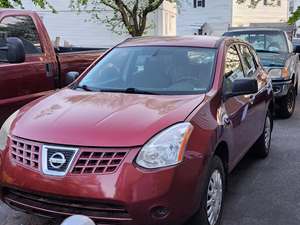 Red 2010 Nissan Rogue