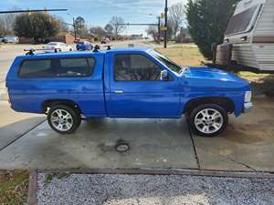 Blue 1987 Nissan Truck