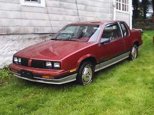 Red 1985 Oldsmobile Calais Indy 500 Pace Car