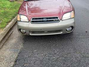 2002 Subaru Outback with Red Exterior