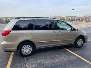 2009 Toyota Sienna with Beige Exterior