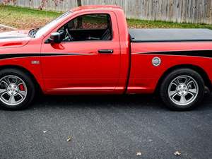 Red 2011 Dodge Ram 100