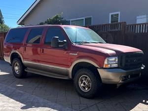 Red 2002 Ford Excursion