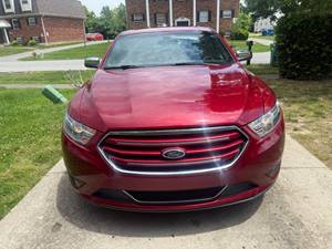 Red 2013 Ford Taurus