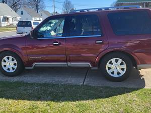 Red 2004 Lincoln Navigator L