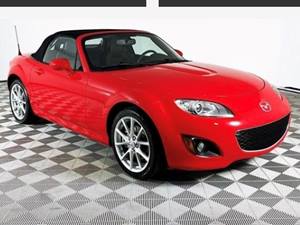 Red 2010 Mazda Miata 