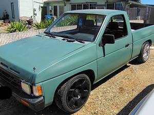 Green 1989 Nissan Truck