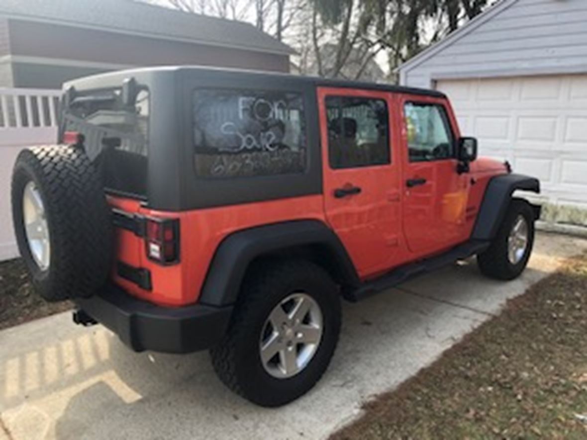 2015 Jeep Wrangler Unlimited for sale by owner in Grand Rapids