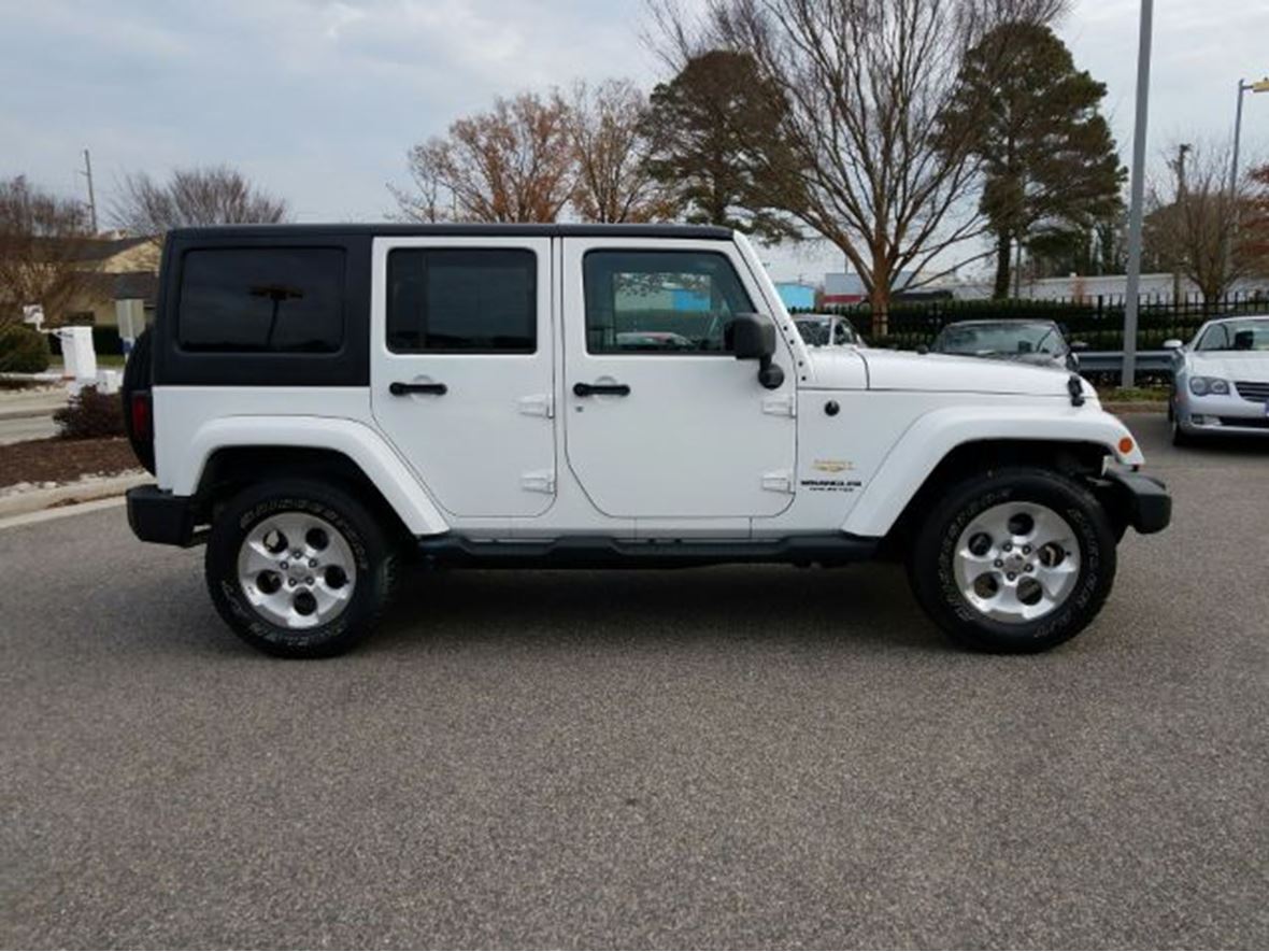 2013 Jeep Wrangler Unlimited Sahara for sale by owner in Madison