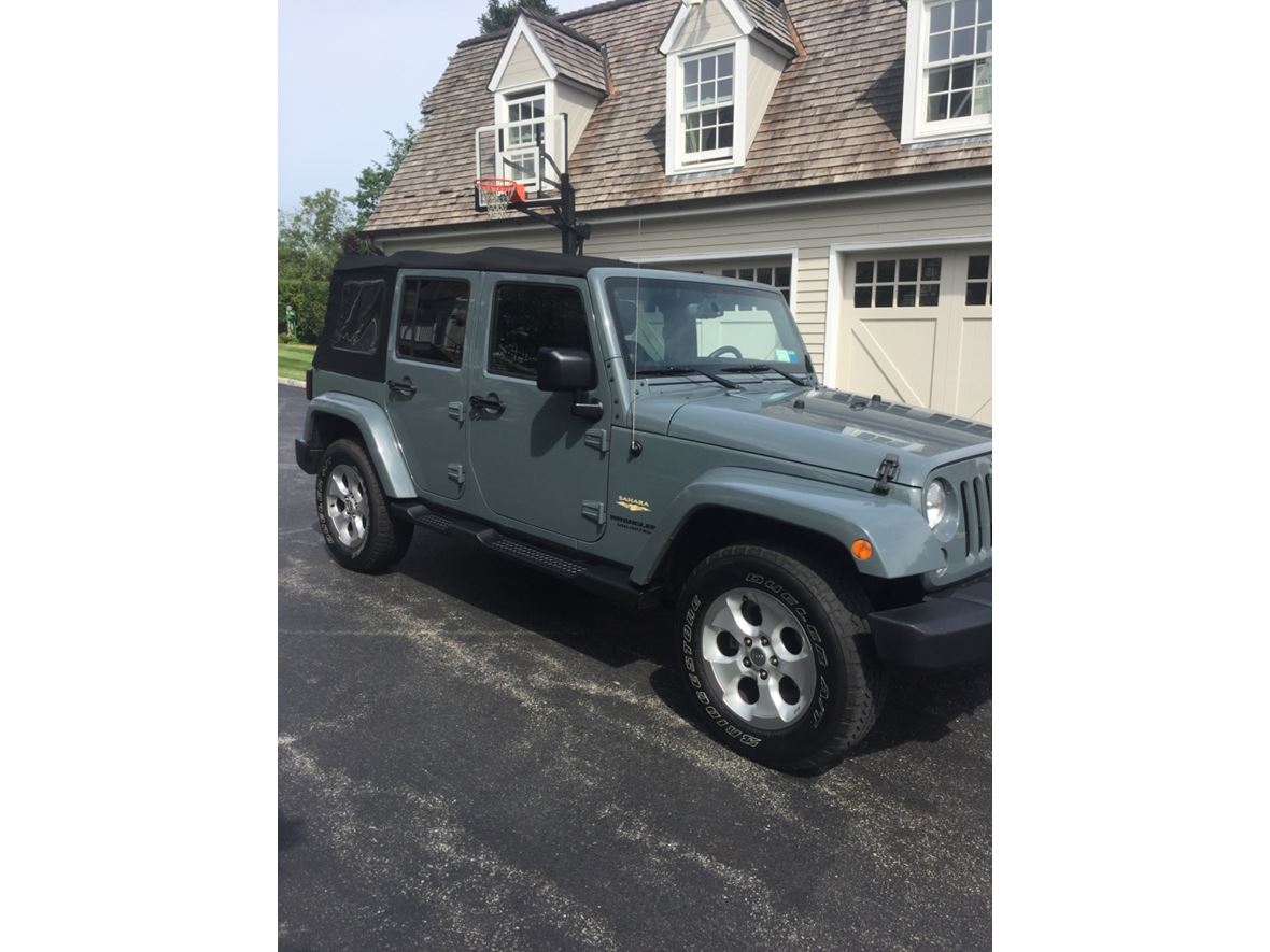 2014 Jeep Wrangler Unlimited Sahara for sale by owner in Katonah