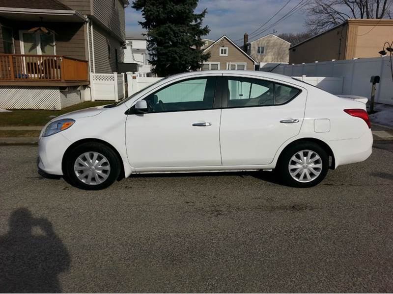 how to turn off tire flat sign in nissan versa 2013
